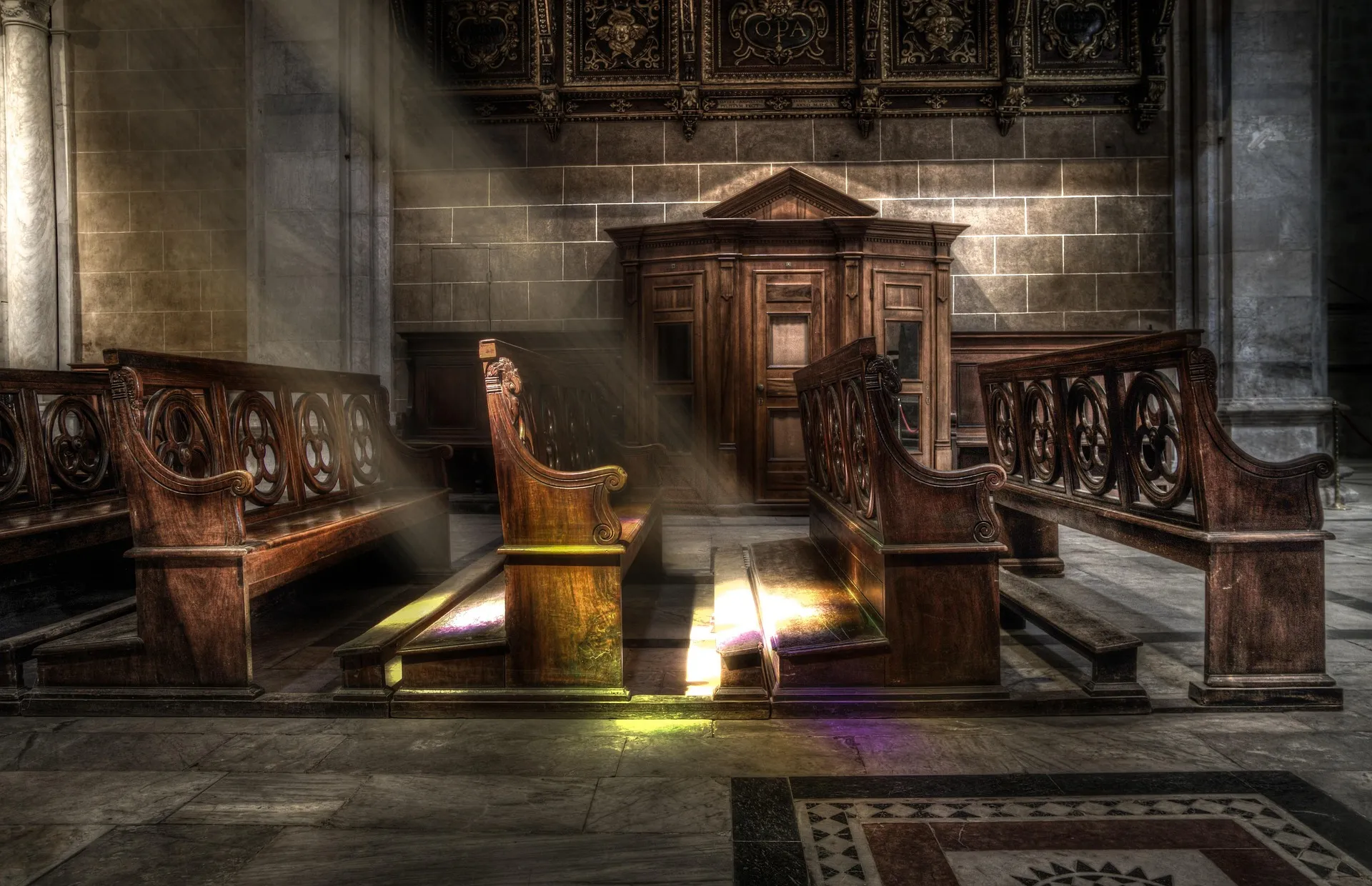 Empty church pews bathed in sunlight, representing the growing number of people leaving institutional Christianity while still seeking spirituality