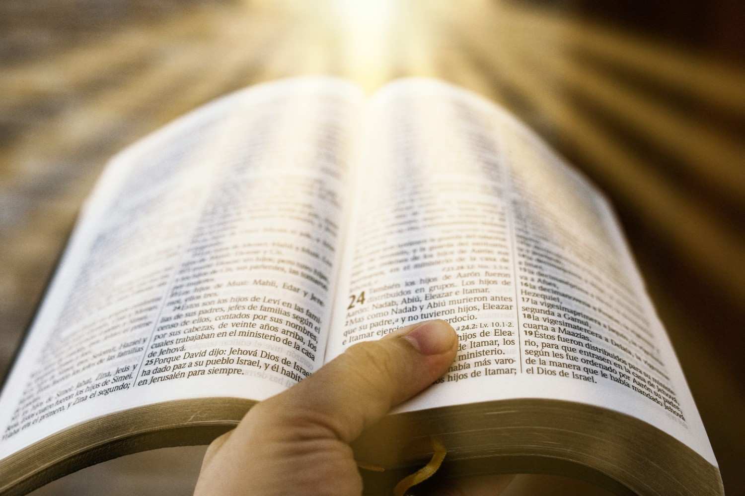 open Bible light rays worship